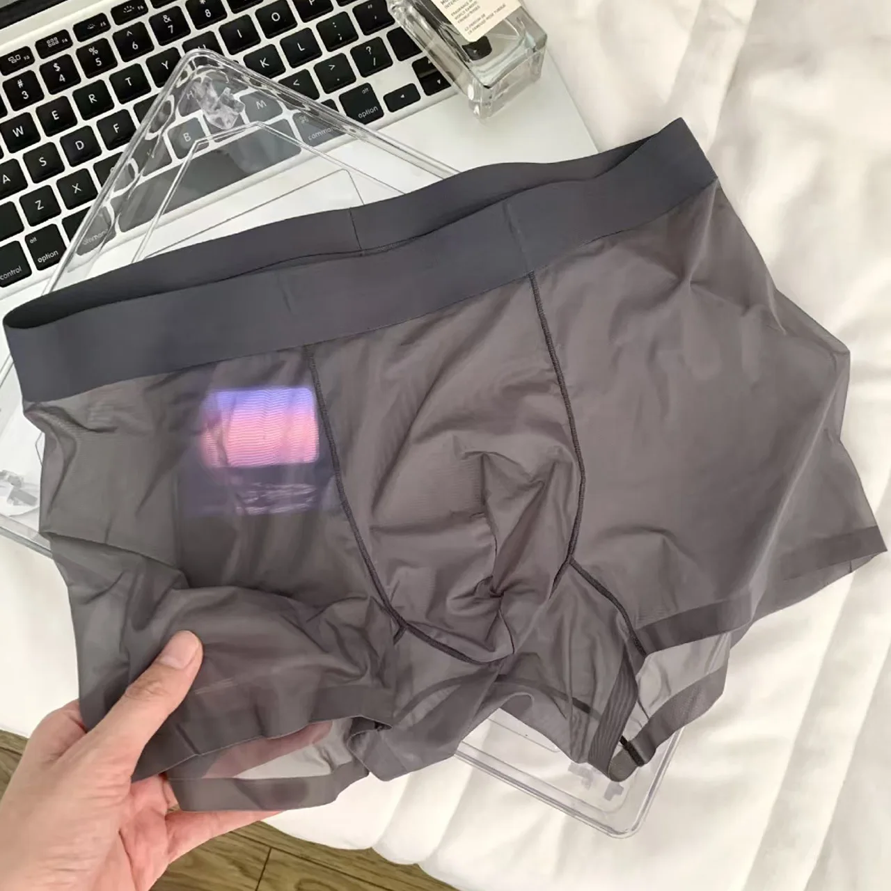 Neue Herren-Boxershorts Transparent Leichtgewichtig Herren-Unterwäsche Elastisch Mittlere Taille U-Konvex Dünn Durchsichtige Shorts Nahtlose Slips Neue Herren-Boxershorts Transparent Leichtgewichtig Herren-Unterwäsche Elastisch Mittlere Taille U-Konvex Dünn Durchsichtige Shorts Nahtlose Slips – Bild 6